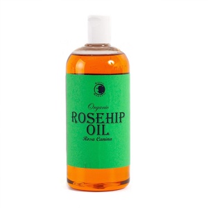 image:imageMystic Moments  Rosehip Organic Carrier Oil  1 Litre  100 Pure  Cold pressed Rosa canina oil gives a smooth refined skin and hair feel for massage and cosmetic blends